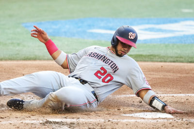 Apr 12, 2025; Miami, Florida, USA;  Washington Nationals catcher Keibert Ruiz (20) scores a run in the third inning against the Miami Marlins at loanDepot Park. Mandatory Credit: Jim Rassol-Imagn Images