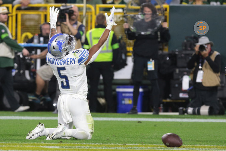 GREEN BAY, WI - SEPTEMBER 28:  Detroit Lions running back David Montgomery (5) celebrates his touchdown during a game between the Green Bay Packers and the Detroit Lions on September 28, 2023 at Lambeau Field in Green Bay, WI. (Photo by Larry Radloff/Icon Sportswire)