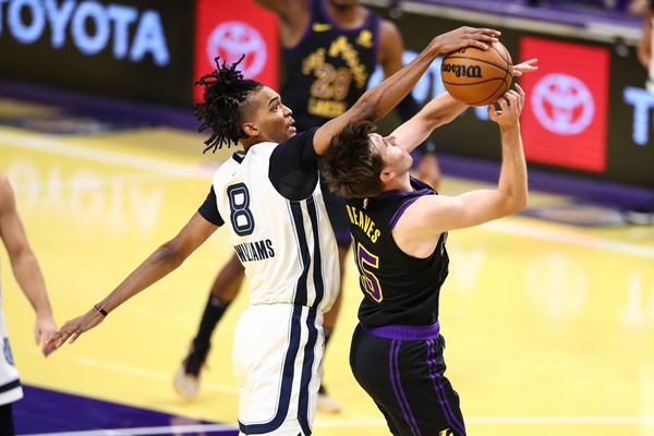 LOS ANGELES, CA - NOVEMBER 14: Memphis Grizzlies forward Ziaire Williams (8) blocks Los Angeles Lakers guard Austin Reaves (15) shot during the Memphis Grizzlies vs Los Angeles Lakers game on November 14, 2023, at Crypto.com Arena in Los Angeles, CA. (Photo by Jevone Moore/Icon Sportswire)