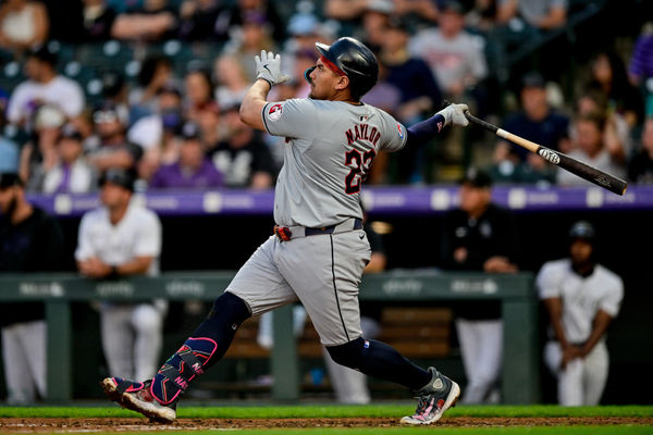 DENVER, CO - MAY 28: Cleveland Guardians first base Josh Naylor (22) hits a fifth inning two-run home run during a game between the Cleveland Guardians and the Colorado Rockies at Coors Field on May 28, 2024 in Denver, Colorado. (Photo by Dustin Bradford/Icon Sportswire)