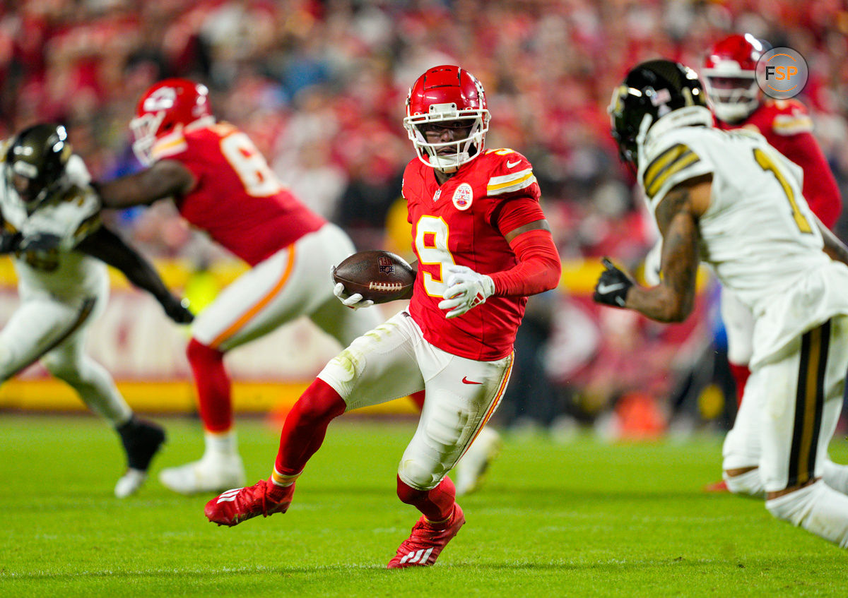 Oct 7, 2024; Kansas City, Missouri, USA; Kansas City Chiefs wide receiver JuJu Smith-Schuster (9) runs with the ball against New Orleans Saints cornerback Alontae Taylor (1) during the first half at GEHA Field at Arrowhead Stadium. Credit: Jay Biggerstaff-Imagn Images