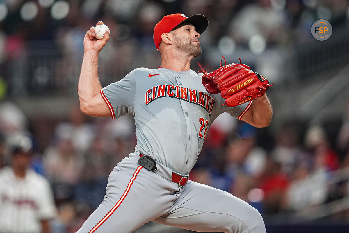 Sep 9, 2024; Cumberland, Georgia, USA; Cincinnati Reds starting pitcher Nick Martinez (28) pitches against the Atlanta Braves during the seventh inning at Truist Park. Credit: Dale Zanine-Imagn Images