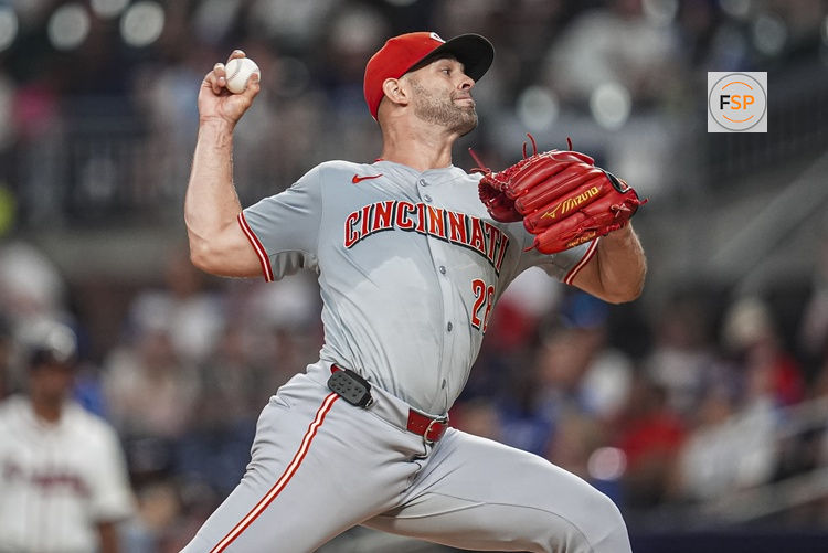 Sep 9, 2024; Cumberland, Georgia, USA; Cincinnati Reds starting pitcher Nick Martinez (28) pitches against the Atlanta Braves during the seventh inning at Truist Park. Credit: Dale Zanine-Imagn Images