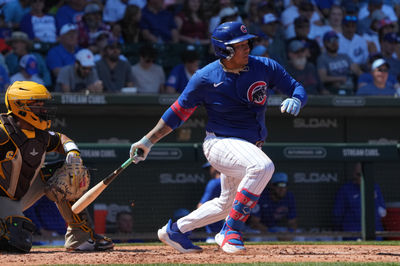 Mar 21, 2025; Mesa, Arizona, USA; Chicago Cubs catcher Moises Ballesteros hits against the San Diego Padres in the first inning at Sloan Park. Mandatory Credit: Rick Scuteri-Imagn Images