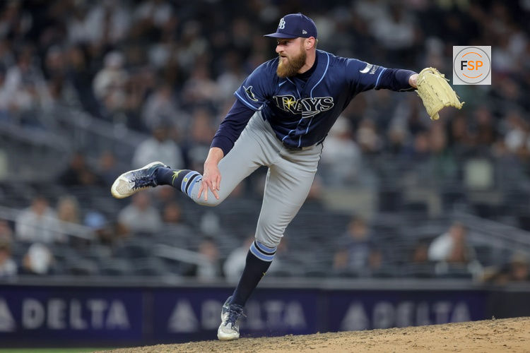 May 22, 2026; Bronx, New York, USA; Tampa Bay Rays pitcher Bryan Baker (47) follows through on a pitch against the New York Yankees during the ninth inning at Yankee Stadium. Credit: Brad Penner-Imagn Images