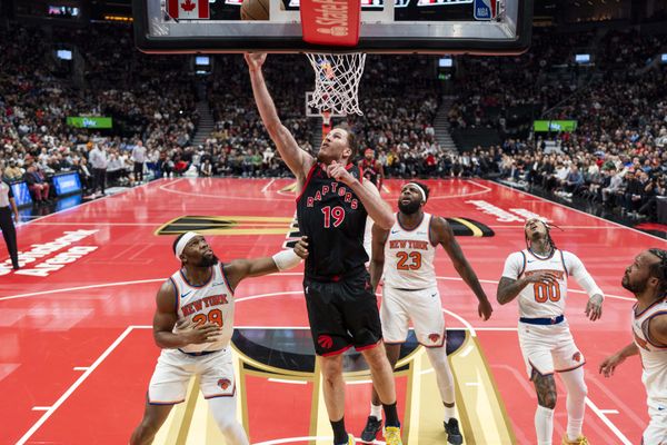 Dec 9, 2025; Toronto, Ontario, CAN;  Toronto Raptors center Jakob Poeltl (19) drives to the basket during the first half against the New York Knicks at the 2025-26 NBA Emirates Cup at Scotiabank Arena. Mandatory Credit: Kevin Sousa-Imagn Images