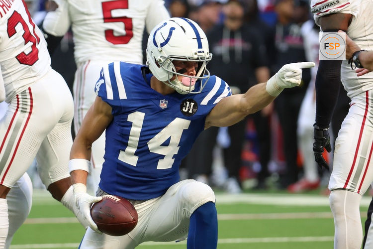 Oct 12, 2025; Indianapolis, Indiana, USA; Indianapolis Colts wide receiver Alec Pierce (14) celebrates after a play against the Arizona Cardinals during the fourth quarter of the game at Lucas Oil Stadium. Credit: Trevor Ruszkowski-Imagn Images