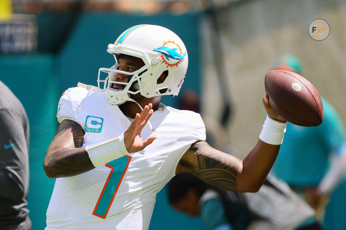 Sep 8, 2024; Miami Gardens, Florida, USA; Miami Dolphins quarterback Tua Tagovailoa (1) throws the football before the game against the Jacksonville Jaguars at Hard Rock Stadium. Credit: Sam Navarro-Imagn Images