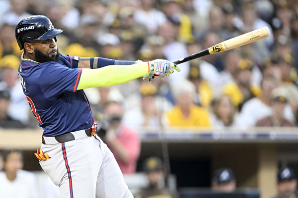 Oct 1, 2024; San Diego, California, USA; Atlanta Braves designated hitter Marcell Ozuna (20) hits a single during the third inning in game one of the Wildcard round for the 2024 MLB Playoffs at Petco Park. Mandatory Credit: Denis Poroy-Imagn Images