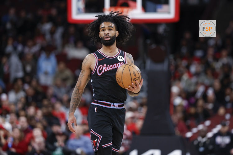 Jan 29, 2026; Chicago, Illinois, USA; Chicago Bulls guard Coby White (0) brings the ball up court against the Miami Heat during the first half at United Center. Credit: Kamil Krzaczynski-Imagn Images