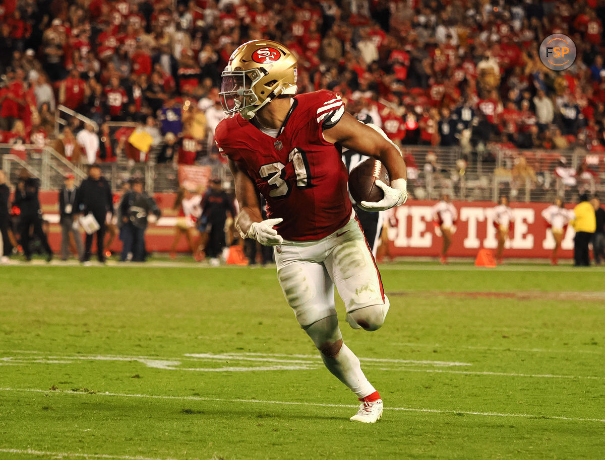 Oct 27, 2024; Santa Clara, California, USA; San Francisco 49ers running back Isaac Guerendo (31) carries the ball against the Dallas Cowboys during the fourth quarter at Levi's Stadium. Credit: Kelley L Cox-Imagn Images