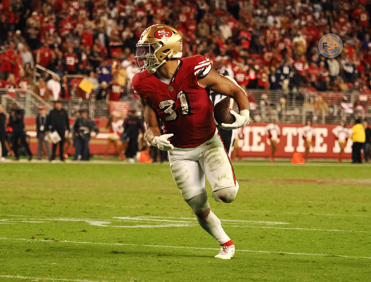 Oct 27, 2024; Santa Clara, California, USA; San Francisco 49ers running back Isaac Guerendo (31) carries the ball against the Dallas Cowboys during the fourth quarter at Levi's Stadium. Credit: Kelley L Cox-Imagn Images