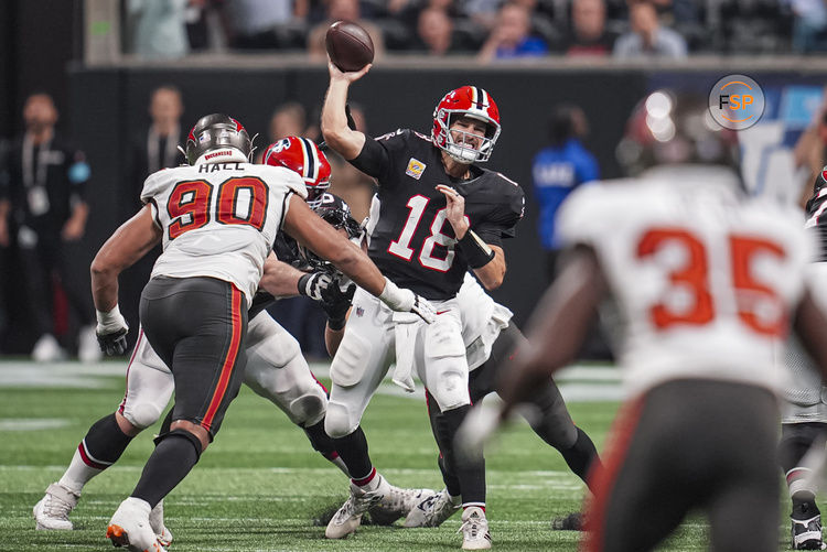 Oct 3, 2024; Atlanta, Georgia, USA; Atlanta Falcons quarterback Kirk Cousins (18) passes the ball against the Tampa Bay Buccaneers in the second half at Mercedes-Benz Stadium. Credit: Dale Zanine-Imagn Images