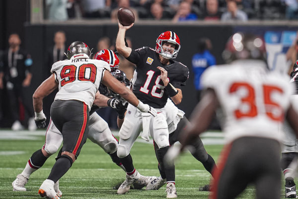 Oct 3, 2024; Atlanta, Georgia, USA; Atlanta Falcons quarterback Kirk Cousins (18) passes the ball against the Tampa Bay Buccaneers in the second half at Mercedes-Benz Stadium. Mandatory Credit: Dale Zanine-Imagn Images