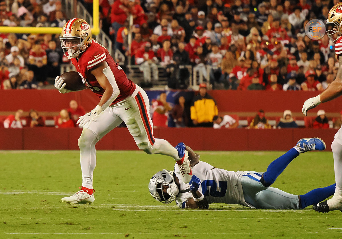 Oct 27, 2024; Santa Clara, California, USA; San Francisco 49ers running back Isaac Guerendo (31) carries the ball against Dallas Cowboys cornerback Jourdan Lewis (2) during the third quarter at Levi's Stadium. Credit: Kelley L Cox-Imagn Images