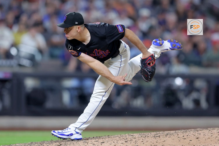 Aug 1, 2025; New York City, New York, USA; New York Mets relief pitcher Ryan Helsley (56) follows through on a pitch against the San Francisco Giants during the ninth inning at Citi Field. Credit: Brad Penner-Imagn Images