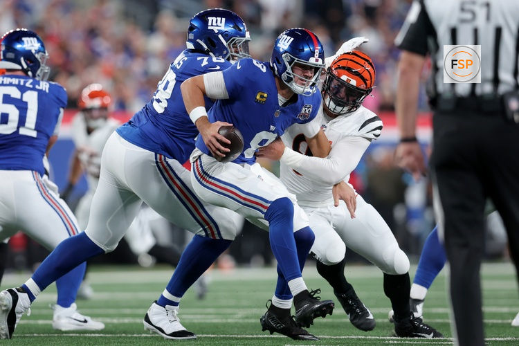 Oct 13, 2024; East Rutherford, New Jersey, USA; Cincinnati Bengals defensive end Trey Hendrickson (91) sacks New York Giants quarterback Daniel Jones (8) during the second quarter at MetLife Stadium. Credit: Brad Penner-Imagn Images