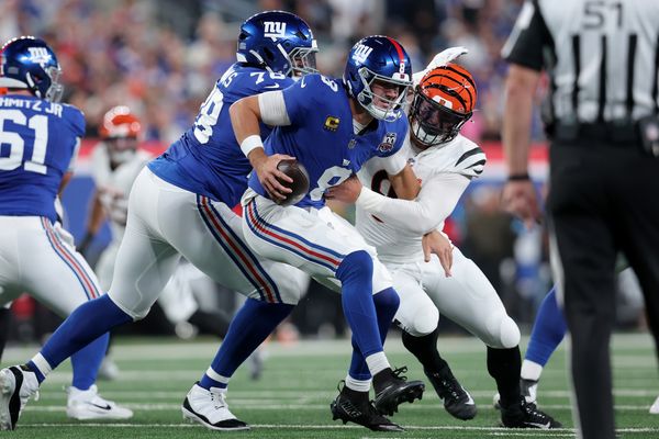 Oct 13, 2024; East Rutherford, New Jersey, USA; Cincinnati Bengals defensive end Trey Hendrickson (91) sacks New York Giants quarterback Daniel Jones (8) during the second quarter at MetLife Stadium. Mandatory Credit: Brad Penner-Imagn Images