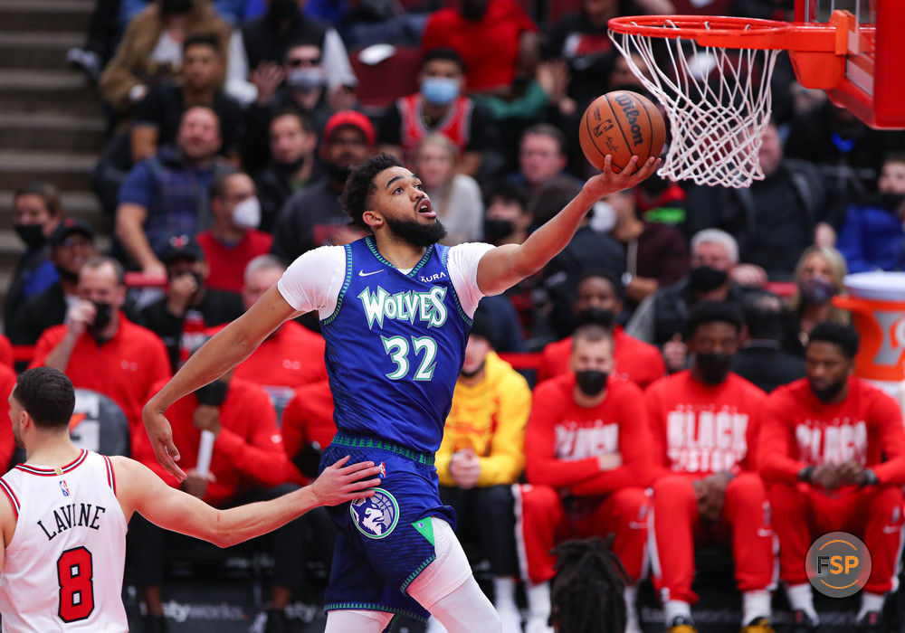 CHICAGO, IL - FEBRUARY 11: Minnesota Timberwolves center Karl-Anthony Towns (32) drives to the basket after a whistle during a NBA game between the Minnesota Timberwolves and the Chicago Bulls on February 11, 2022 at the United Center in Chicago, IL. (Photo by Melissa Tamez/Icon Sportswire)