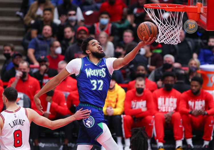 CHICAGO, IL - FEBRUARY 11: Minnesota Timberwolves center Karl-Anthony Towns (32) drives to the basket after a whistle during a NBA game between the Minnesota Timberwolves and the Chicago Bulls on February 11, 2022 at the United Center in Chicago, IL. (Photo by Melissa Tamez/Icon Sportswire)