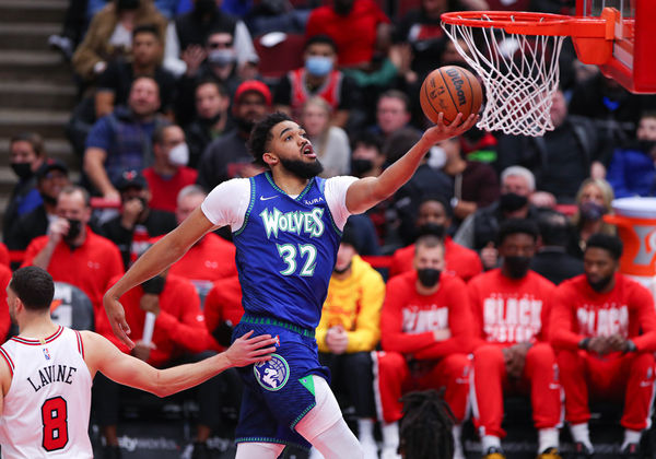 CHICAGO, IL - FEBRUARY 11: Minnesota Timberwolves center Karl-Anthony Towns (32) drives to the basket after a whistle during a NBA game between the Minnesota Timberwolves and the Chicago Bulls on February 11, 2022 at the United Center in Chicago, IL. (Photo by Melissa Tamez/Icon Sportswire)