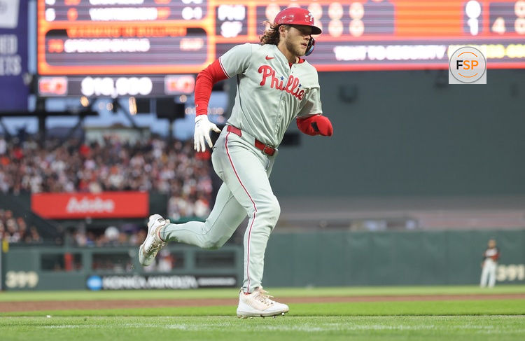 Jul 8, 2025; San Francisco, California, USA; Philadelphia Phillies third baseman Alec Bohm (28) scores a run against the San Francisco Giants during the sixth inning at Oracle Park. Credit: Kelley L Cox-Imagn Images