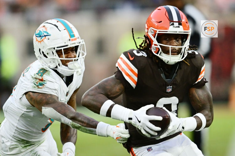 Dec 29, 2024; Cleveland, Ohio, USA; Cleveland Browns wide receiver Jerry Jeudy (3) runs with the ball after a catch as Miami Dolphins safety Jevon Holland (8) defends during the first half at Huntington Bank Field. Credit: Ken Blaze-Imagn Images