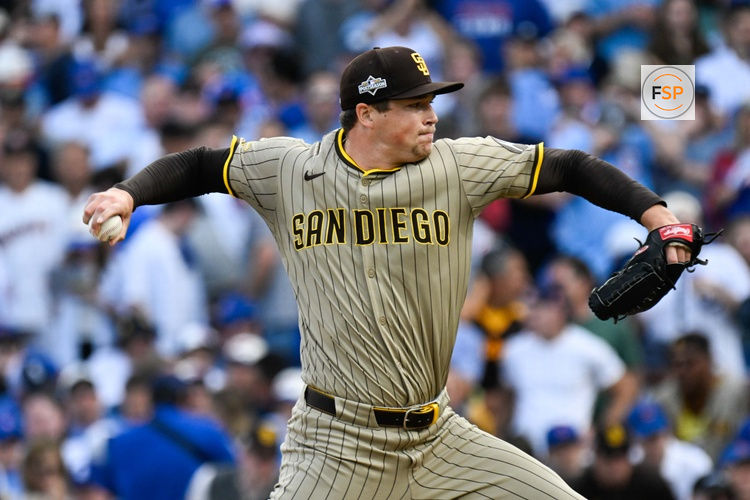 Oct 1, 2025; Chicago, Illinois, USA; San Diego Padres pitcher Mason Miller (22) delivers during the seventh inning against the Chicago Cubs during game two of the Wildcard round for the 2025 MLB playoffs at Wrigley Field. Credit: Matt Marton-Imagn Images