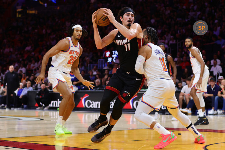 Oct 30, 2024; Miami, Florida, USA; Miami Heat guard Jaime Jaquez Jr. (11) drives to the basket against New York Knicks guard Jalen Brunson (11) during the second quarter at Kaseya Center. Credit: Sam Navarro-Imagn Images