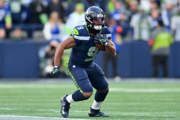 Jan 25, 2026; Seattle, WA, USA; Seattle Seahawks running back Kenneth Walker III (9) runs against the Los Angeles Rams in the first half in the 2026 NFC Championship Game at Lumen Field. Mandatory Credit: Steven Bisig-Imagn Images
