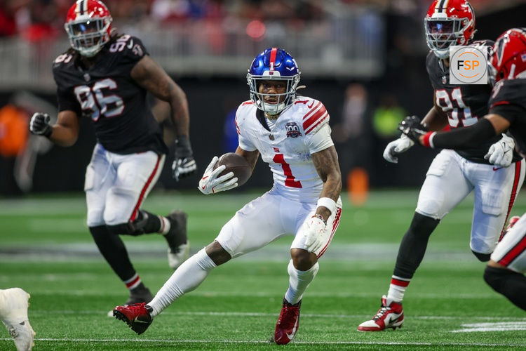 Dec 22, 2024; Atlanta, Georgia, USA; New York Giants wide receiver Malik Nabers (1) runs after a catch against the Atlanta Falcons in the fourth quarter at Mercedes-Benz Stadium. Credit: Brett Davis-Imagn Images