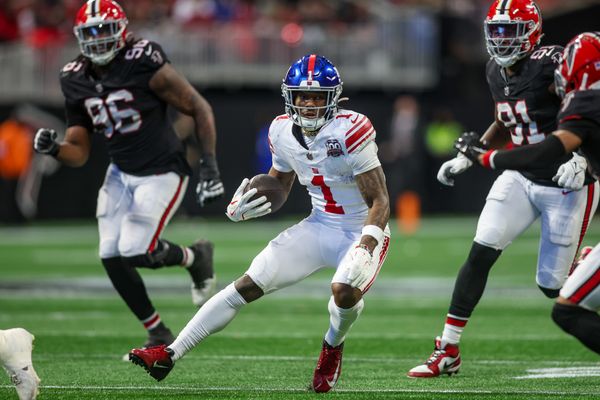 Dec 22, 2024; Atlanta, Georgia, USA; New York Giants wide receiver Malik Nabers (1) runs after a catch against the Atlanta Falcons in the fourth quarter at Mercedes-Benz Stadium. Mandatory Credit: Brett Davis-Imagn Images