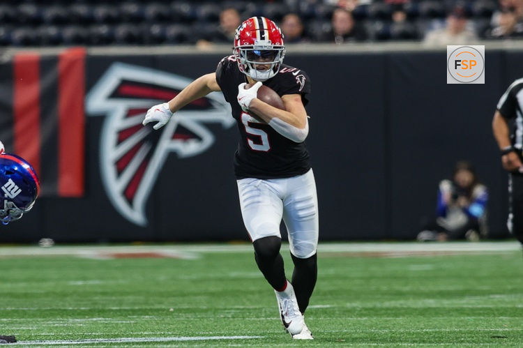 Dec 22, 2024; Atlanta, Georgia, USA; Atlanta Falcons wide receiver Drake London (5) runs after a catch against the New York Giants in the third quarter at Mercedes-Benz Stadium. Credit: Brett Davis-Imagn Images
