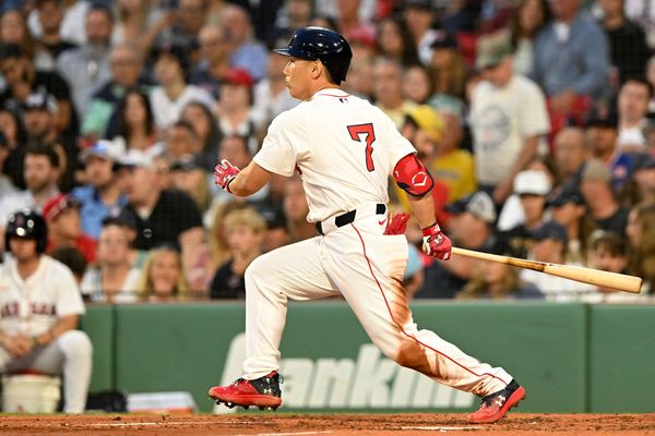 Jul 9, 2025; Boston, Massachusetts, USA;  Boston Red Sox designated hitter Masataka Yoshida (7) hits a RBI single against the Colorado Rockies during the fourth inning at Fenway Park. Mandatory Credit: Brian Fluharty-Imagn Images
