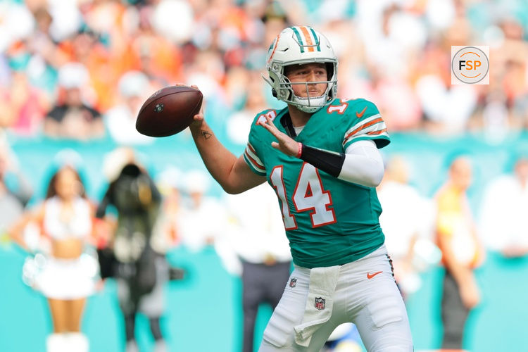 Dec 21, 2025; Miami Gardens, Florida, USA; Miami Dolphins quarterback Quinn Ewers (14) drops back for a pass during the first quarter at Hard Rock Stadium. Credit: Sam Navarro-Imagn Images