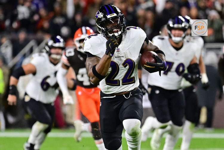 Nov 16, 2025; Cleveland, Ohio, USA; Baltimore Ravens running back Derrick Henry (22) runs for a gain during the fourth quarter against the Cleveland Browns at Huntington Bank Field. Credit: Ken Blaze-Imagn Images