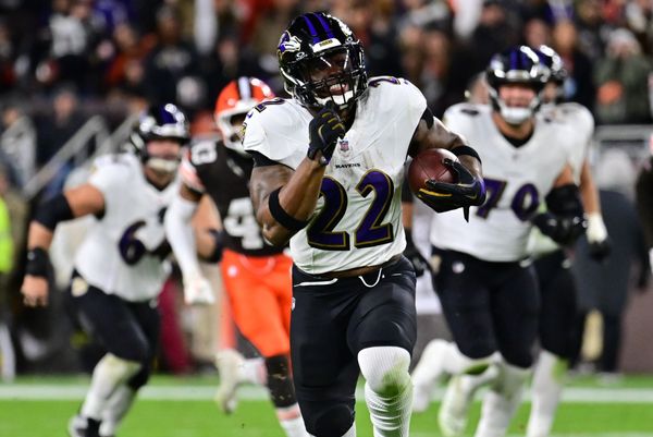 Nov 16, 2025; Cleveland, Ohio, USA; Baltimore Ravens running back Derrick Henry (22) runs for a gain during the fourth quarter against the Cleveland Browns at Huntington Bank Field. Mandatory Credit: Ken Blaze-Imagn Images