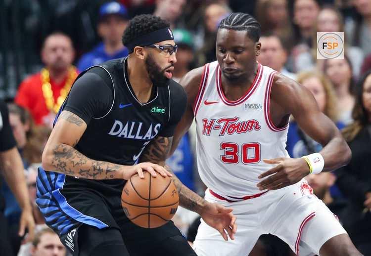 Jan 3, 2026; Dallas, Texas, USA;  Dallas Mavericks forward Anthony Davis (3) drives to the basket as Houston Rockets center Clint Capela (30) defends during the first quarter at American Airlines Center. Credit: Kevin Jairaj-Imagn Images