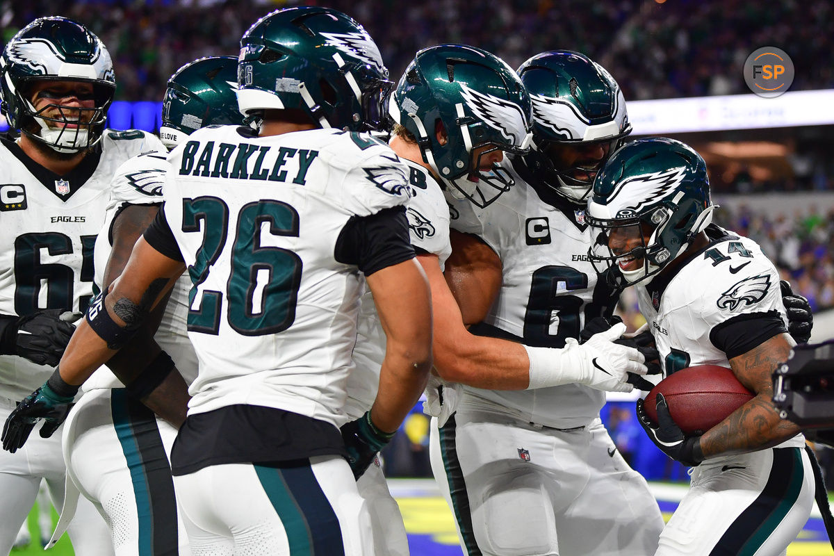 Nov 24, 2024; Inglewood, California, USA; Philadelphia Eagles celebrate the touchdown scored by running back Kenneth Gainwell (14) during the second half at SoFi Stadium. Credit: Gary A. Vasquez-Imagn Images