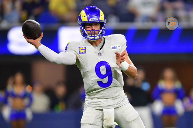 Oct 24, 2024; Inglewood, California, USA; Los Angeles Rams quarterback Matthew Stafford (9) throws against the Minnesota Vikings during the first half at SoFi Stadium. Credit: Gary A. Vasquez-Imagn Images