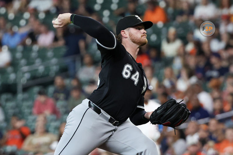 Jun 10, 2025; Houston, Texas, USA; Chicago White Sox starting pitcher Shane Smith (64) pitches against the Houston Astros in the first inning at Daikin Park. Credit: Thomas Shea-Imagn Images