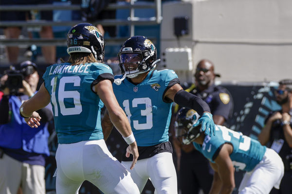 JACKSONVILLE, FL - OCTOBER 15: Jacksonville Jaguars quarterback Trevor Lawrence (16) and Jacksonville Jaguars wide receiver Christian Kirk (13) celebrate a touchdown during the game between the against the Indianapolis Colts and theJacksonville Jaguars on October 15, 2023 at Ever bank Stadium in Jacksonville, Florida. (Photo by David Rosenblum/Icon Sportswire)