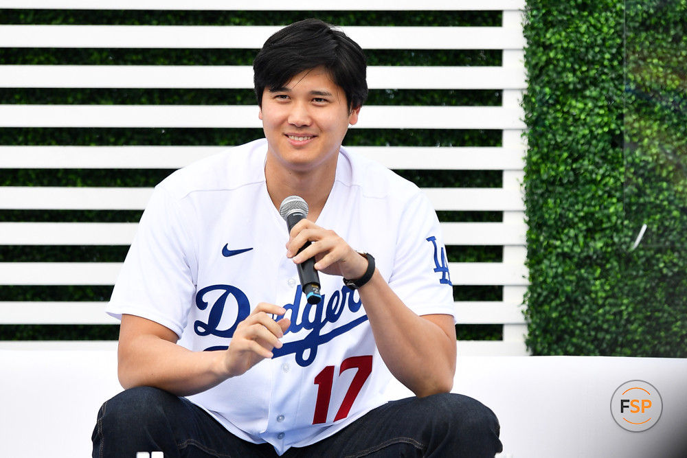 LOS ANGELES, CA - FEBRUARY 03: Los Angeles Dodgers designated hitter Shohei Ohtani (17) looks on during DodgerFest at Dodger Stadium on February 03, 2024 in Los Angeles, California. (Photo by Brian Rothmuller/Icon Sportswire)