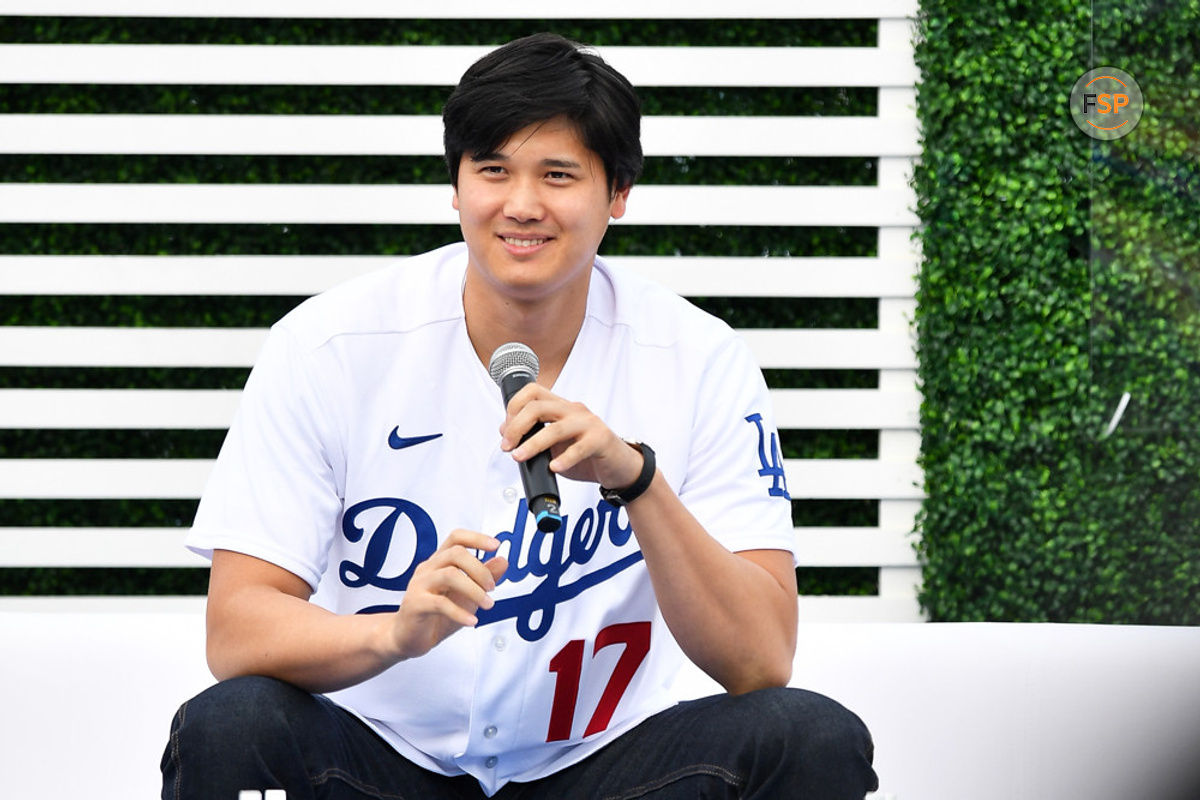 LOS ANGELES, CA - FEBRUARY 03: Los Angeles Dodgers designated hitter Shohei Ohtani (17) looks on during DodgerFest at Dodger Stadium on February 03, 2024 in Los Angeles, California. (Photo by Brian Rothmuller/Icon Sportswire)