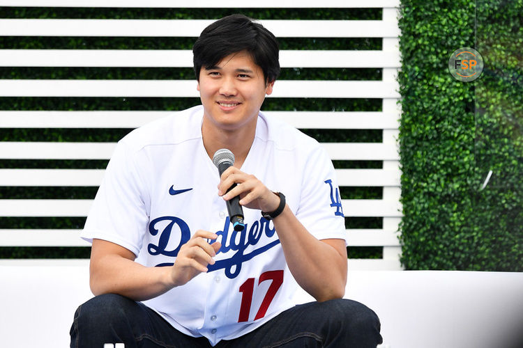 LOS ANGELES, CA - FEBRUARY 03: Los Angeles Dodgers designated hitter Shohei Ohtani (17) looks on during DodgerFest at Dodger Stadium on February 03, 2024 in Los Angeles, California. (Photo by Brian Rothmuller/Icon Sportswire)