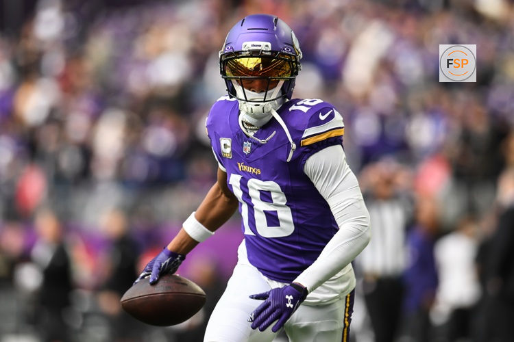 Nov 9, 2025; Minneapolis, Minnesota, USA; Minnesota Vikings wide receiver Justin Jefferson (18) warms up before the game against the Baltimore Ravens at U.S. Bank Stadium. Credit: Jeffrey Becker-Imagn Images
