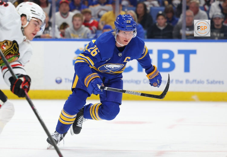 Oct 3, 2026; Buffalo, New York, USA;  Buffalo Sabres defenseman Rasmus Dahlin (26) goes after a loose puck during the second period against the Chicago Blackhawks at KeyBank Center. Credit: Timothy T. Ludwig-Imagn Images