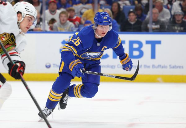 Oct 3, 2026; Buffalo, New York, USA;  Buffalo Sabres defenseman Rasmus Dahlin (26) goes after a loose puck during the second period against the Chicago Blackhawks at KeyBank Center. Mandatory Credit: Timothy T. Ludwig-Imagn Images