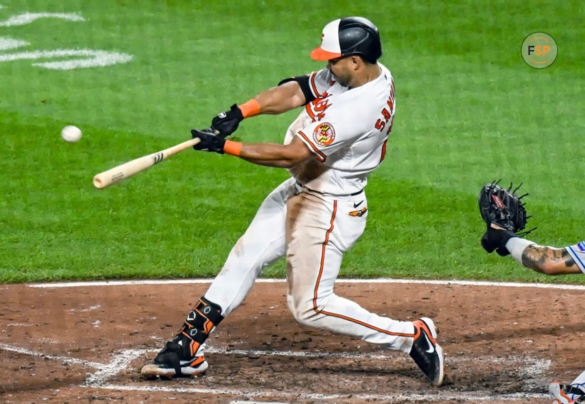 BALTIMORE, MD - August 5: Baltimore Orioles right fielder Anthony Santander (25) hits a home run during the New York Mets versus the Baltimore Orioles on August 5, 2023 at Oriole Park at Camden Yards in Baltimore, MD.  (Photo by Mark Goldman/Icon Sportswire)