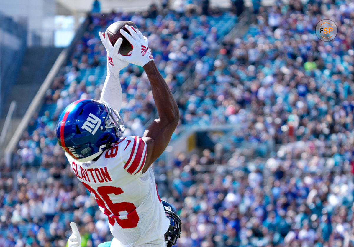 JACKSONVILLE, FL - OCTOBER 23: New York Giants wide receiver Darius Slayton (86) receive a catch in the end zone for a touchdown on their opening drive during the NFL Football match between the Jacksonville Jaguars and New York Giants on October 23, 2022 at TIAA Bank Field, FL. (Photo by Andrew Bershaw/Icon Sportswire)